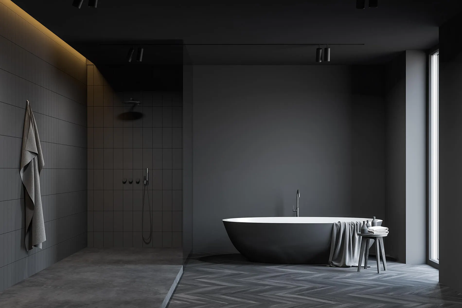 Dark-toned bathroom with a black freestanding bath, part of a Ballarat renovation project