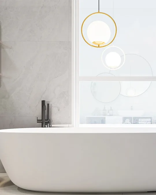 Freestanding bath beneath a window in a renovated Ballarat bathroom
